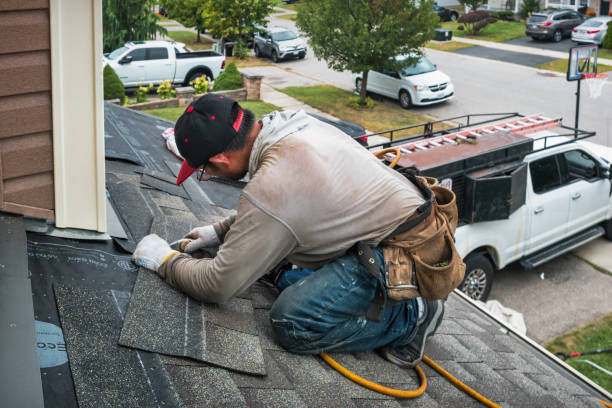 Professional Storm Damage Roof Repair technician working in Depew, NY